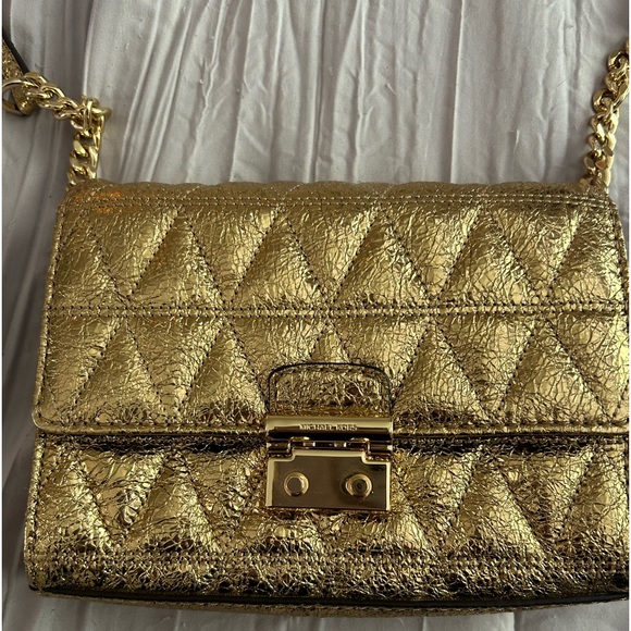 Michael Kors Golden Chained Crossbody Bag with squeeze closure - Picture 1 of 8